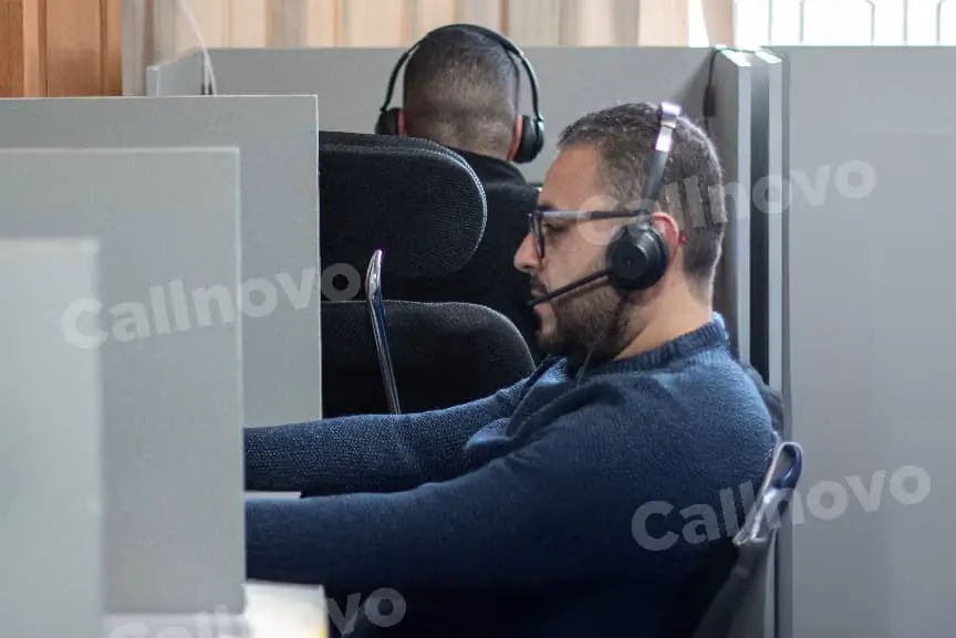 Callnovo support agents working at their workstations, providing technical support for HPDC's compressor line