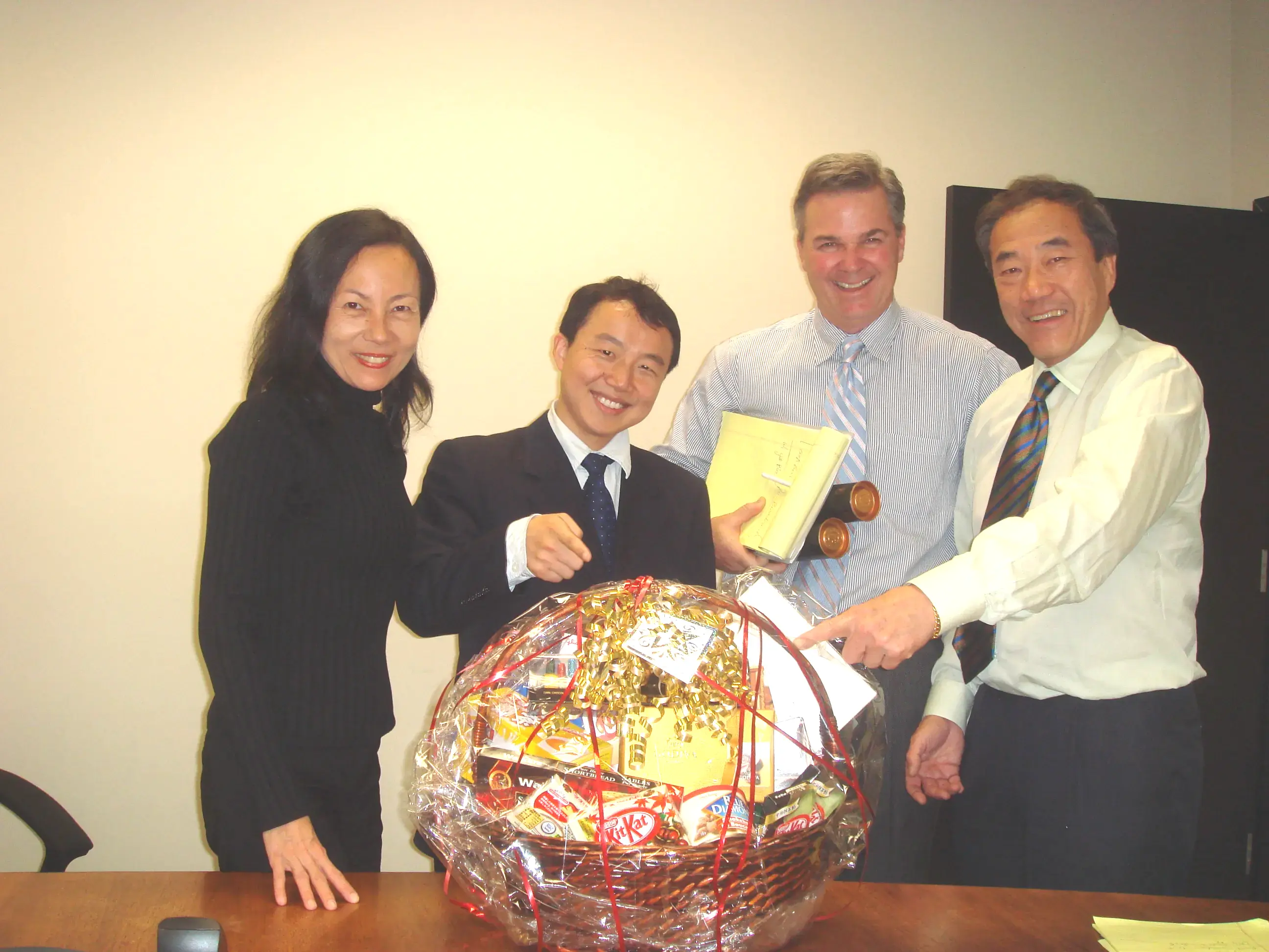 Jackie Xu with KylinTV top management team, including founder Charles Wang and Nancy Li